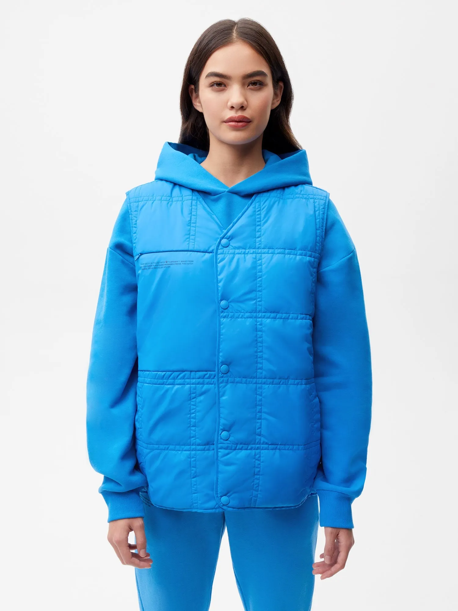 Womens Flower-Warmth Quilted Gilet—cerulean blue