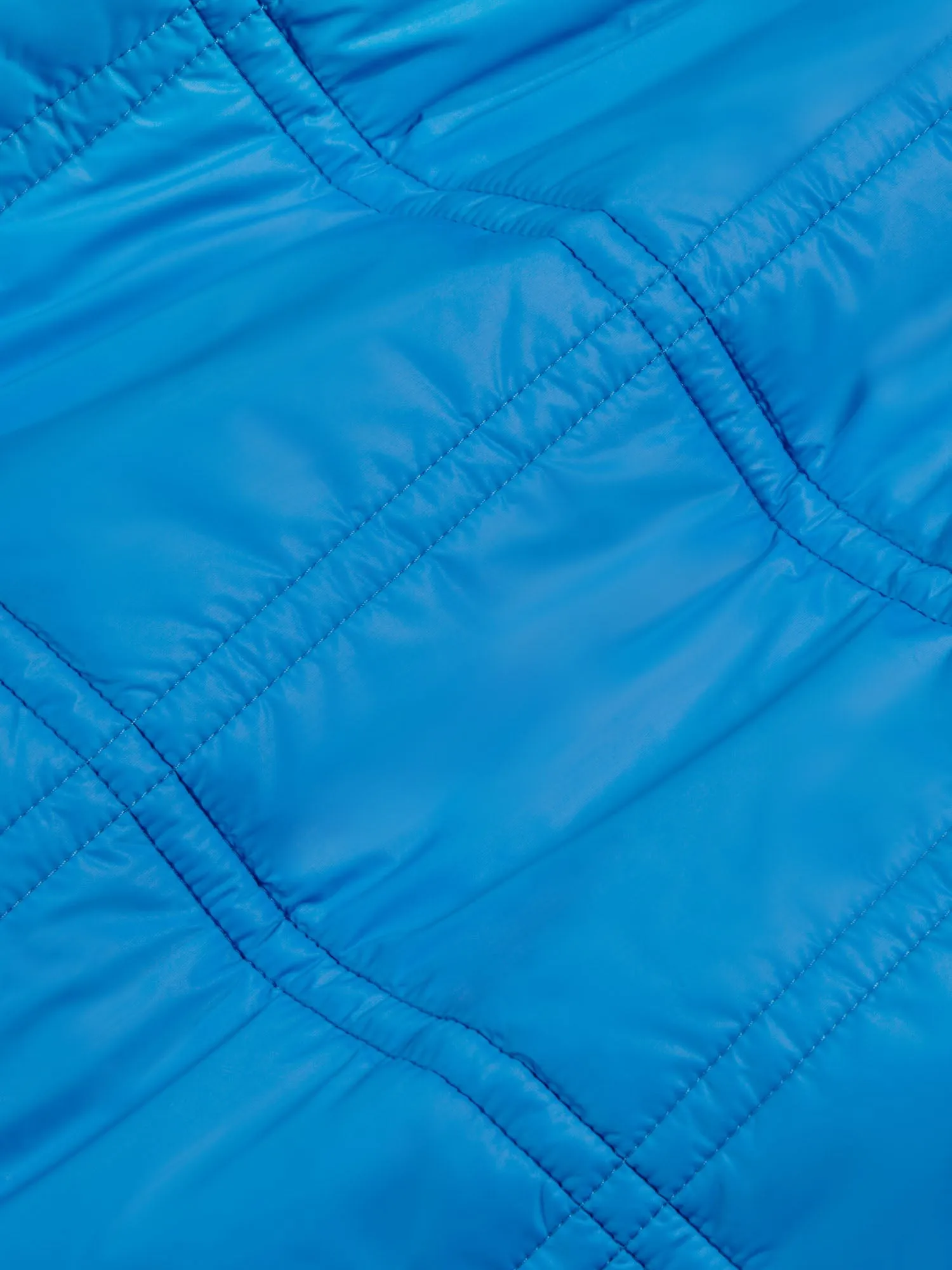 Womens Flower-Warmth Quilted Gilet—cerulean blue
